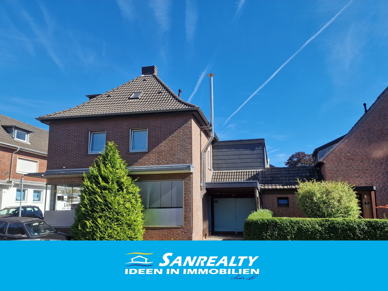SANREALTY | VERKAUFT | Vollvermietetes Wohn- und Geschäftshaus mit neun Garagen in Eschweiler-Hücheln