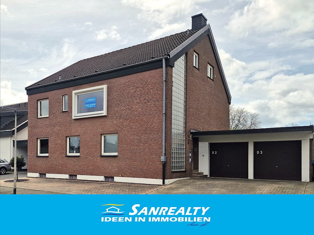 SANREALTY | VERKAUFT | Erdgeschoss-Wohnung mit Garten, Doppelgarage und zwei Stellplätzen in Jülich